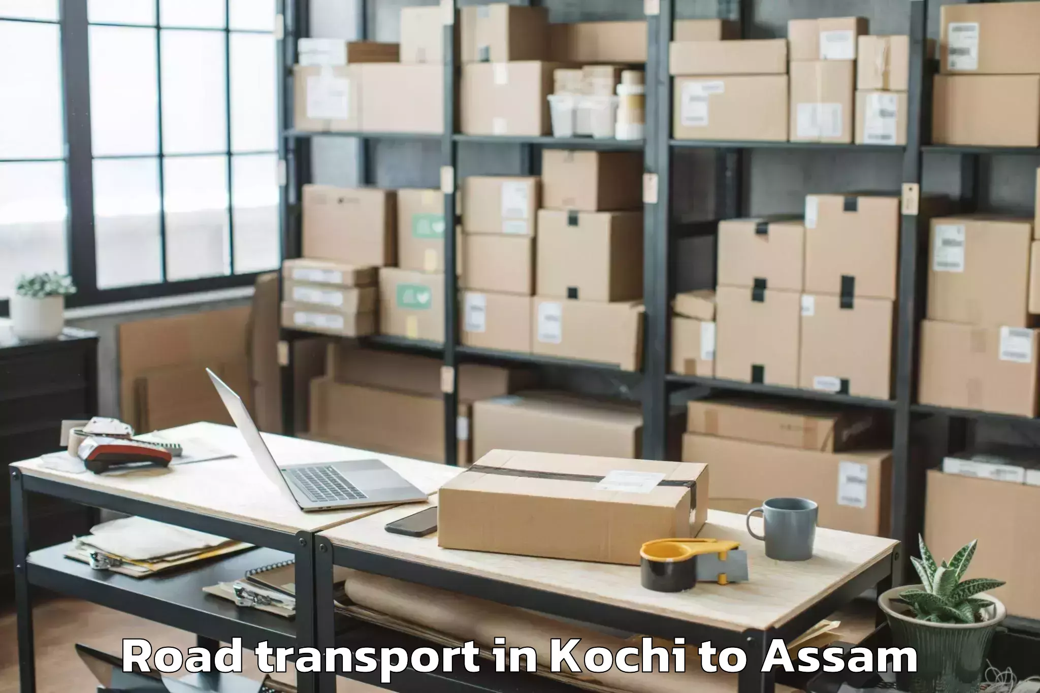 Top Kochi to Sonari Road Transport Available